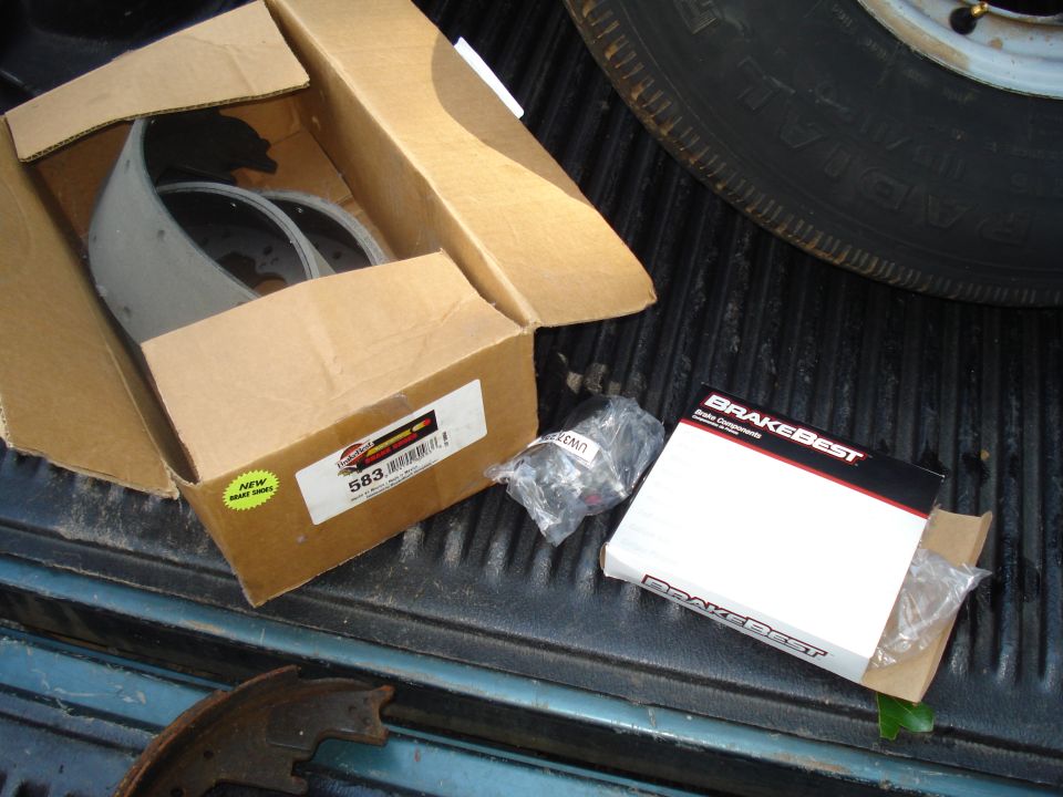 Box of brake shoes and brake components in a truck bed