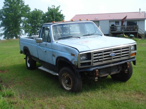 1984 Ford F-250 - This pickup truck appears to be from the early 1980s, likely a Ford F-Series.