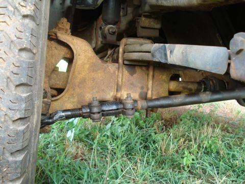 1984 Ford F-250 - Close-up of the front steering linkage and suspension on a 1984 Ford F-250.