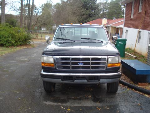 1994 Ford F-350 - Front view of a 1994 Ford F-350 pickup truck parked in a driveway.