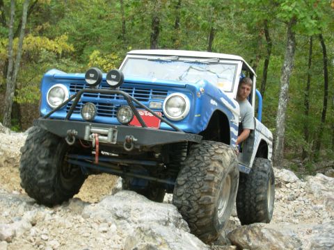 1983 Ford Bronco - Modified Ford Bronco navigating a challenging rocky trail.