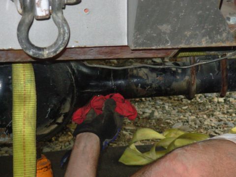 1983 Ford Bronco - The axle tube broke all the way around. He's ratchet-strapping back together so it can be welded up.