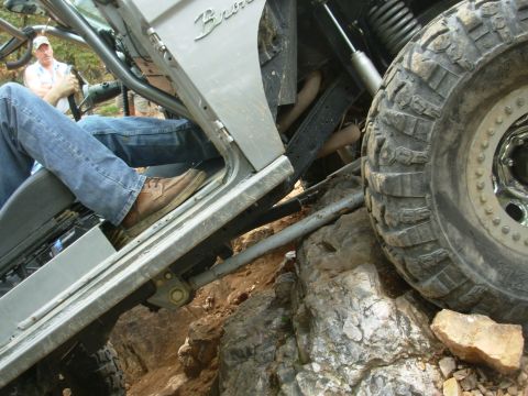 1983 Ford Bronco - The "Bronco" badge is visible inside this 1983 Ford Bronco as it navigates rocky terrain.