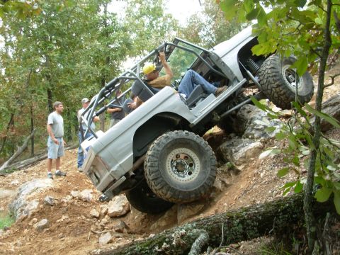 1983 Ford Bronco - This heavily modified 1983 Ford Bronco navigates a challenging off-road obstacle course.