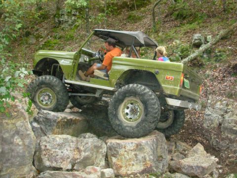 1983 Ford Bronco - This modified 1978 Ford Bronco tackles a rocky trail with its occupants enjoying the ride.