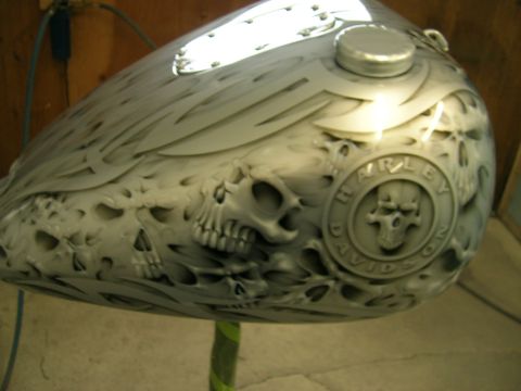 2010 Harley-Davidson Electra Glide - Custom painted motorcycle gas tank skull artwork and Harley-Davidson branding.