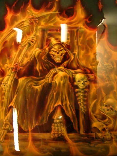2010 Harley-Davidson Electra Glide - Motorcycle fender features an airbrushed grim reaper seated on a throne surrounded by flames and skulls.