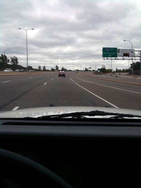 2003 Ford Crown Victoria - Minnesota State Patol, merged behind him, took off en-route, as i shot this from iphone.
