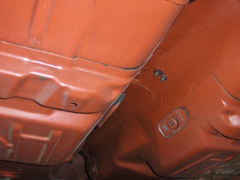 1970 Chevrolet Camaro - The underside of a vehicle shows structural components and mounting hardware, with a watermark for SuperMotors.net.