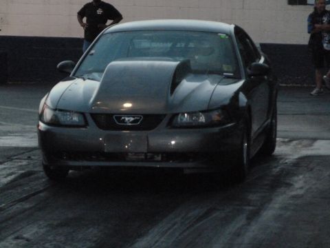 1992 Ford Mustang - Front view of a Ford Mustang modified with a prominent hood scoop.
