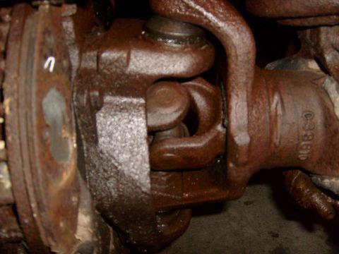 1994 Ford Bronco - This close-up shows a driveshaft universal joint, possibly from a truck or SUV, with a visible part number.