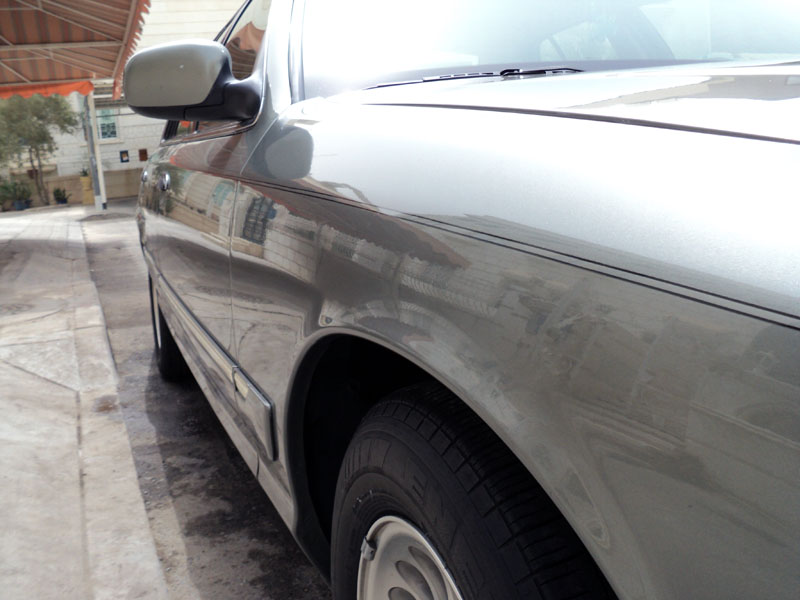 Silver 2001 Mercury Grand Marquis side view