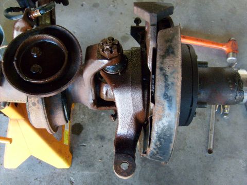 1994 Ford Bronco - Front axle assembly for a Ford Bronco, likely undergoing maintenance or repair.