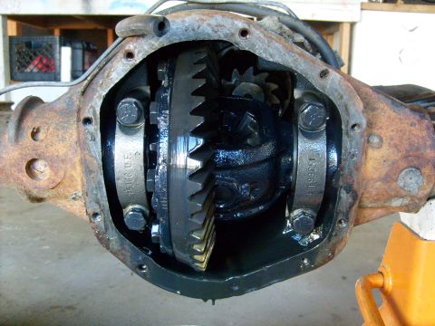 1994 Ford Bronco - Close-up view of a vehicle's differential assembly, revealing internal gears and housing.