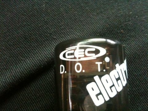 1995 Ford Bronco - Close-up of a black part labeled CEC DOT electric.