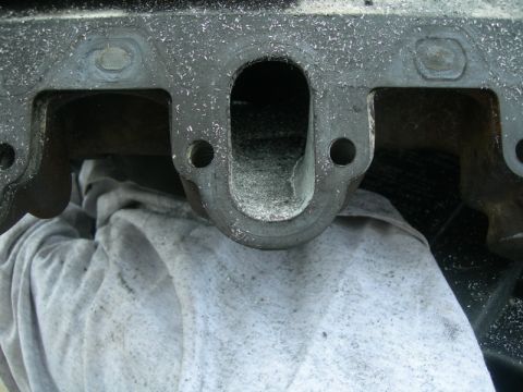 1984 Ford Bronco - Intake manifold part shown during a diesel rebuild process.