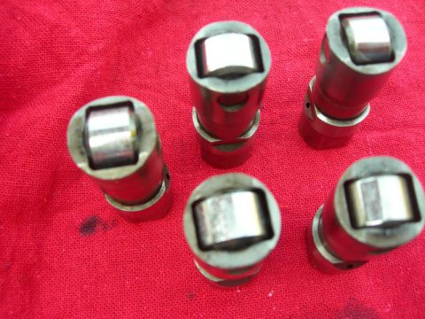 1984 Ford Bronco - Engine lifters shown on a red cloth, likely for a rebuild or repair.