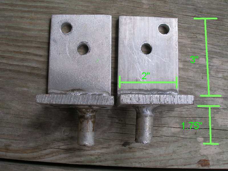 Two metal brackets with dimensions 2" wide and 3" tall marked
