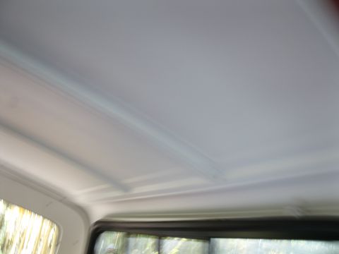 1978 Ford Bronco - The interior ceiling of a vehicle is visible, with a watermark reading 'SUPERMOTORS' at the bottom right.