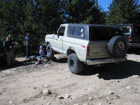 1978 Ford Bronco - 1978 Ford Bronco with a spare tire mounted on the rear tailgate.