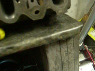 1984 Ford Bronco - Close-up of an engine part, likely from a diesel rebuild, with the SuperMotors.net logo visible.
