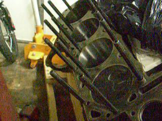 1984 Ford Bronco - Engine block with pistons and connecting rods. SuperMotors logo is visible.
