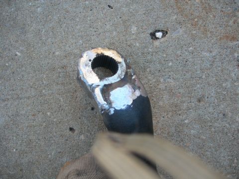 1984 Ford Bronco - A close-up view of a metal component that has undergone welding repairs.