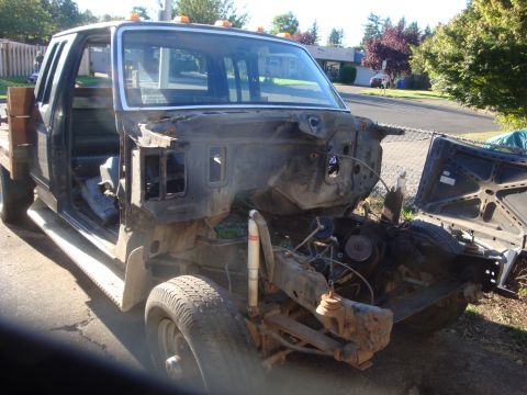 1989 Ford Bronco - Front end of a 1989 Ford F-250 truck, stripped down for parts or repair.