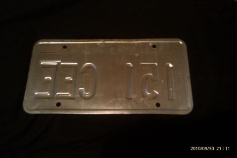 2000 Mercury Grand Marquis - License plate with embossed characters 'CEE 121' against a dark background.