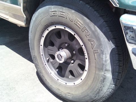 1987 Ford Bronco - 16X8 Eagle Off Road Alloys. Part # 1408-7857 Came with the Bronk, Tires were 235x85x16 Ameritrac General Radials with bubbles that make it…
