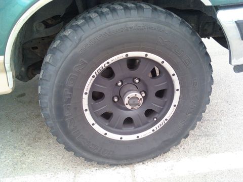 1987 Ford Bronco - Now I have 285/75/16 Remington Mud Brutes, Cheap I know, but I got 'em cheap alright! Plus I don't have the speed bubbles in the sidewall a…
