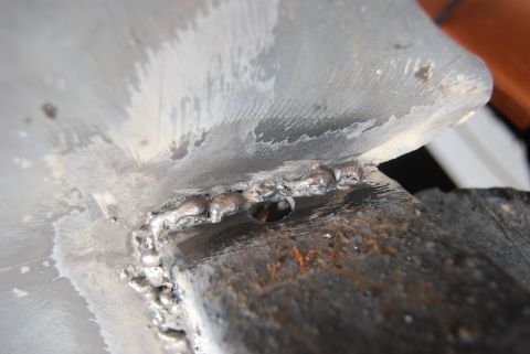 1982 Ford Bronco - Detail of welded metal, showing the texture and imperfections of the join.