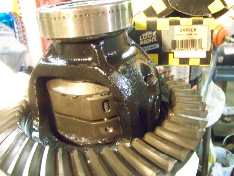 1989 Ford Bronco - Close-up of a differential carrier and ring gear, with a "Lock Right" product box visible.
