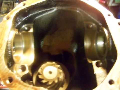 1989 Ford Bronco - Close-up view of a vehicle's differential housing, showing internal gears and bearing mounts.