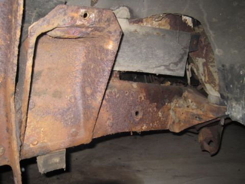 1979 Ford Bronco - The vehicle's frame shows significant rust and corrosion, indicating potential structural weakness.