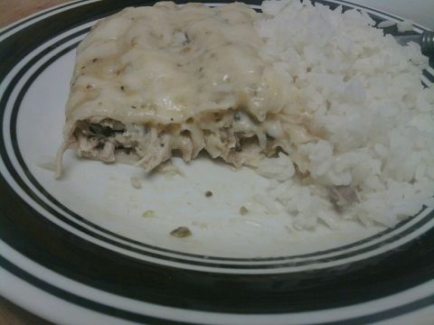 1989 Ford Bronco - A close-up of a meal on a plate, showing a casserole next to a pile of white rice.