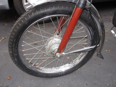 1981 Garelli Rally Sport - Close-up of a motorcycle's front wheel and suspension components.