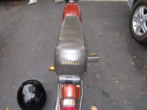 1981 Garelli Rally Sport - The seat of a motorcycle displays the Garelli brand name.