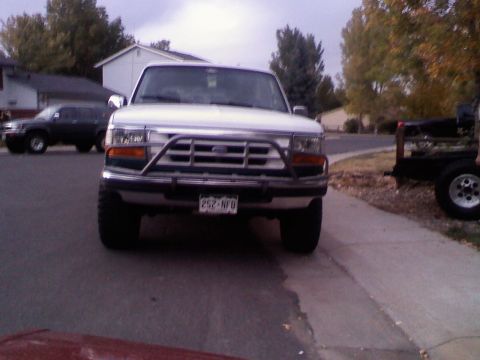1996 Ford Bronco - This 1996 Ford Bronco is seen from the front, equipped with a brush guard and a visible license plate.