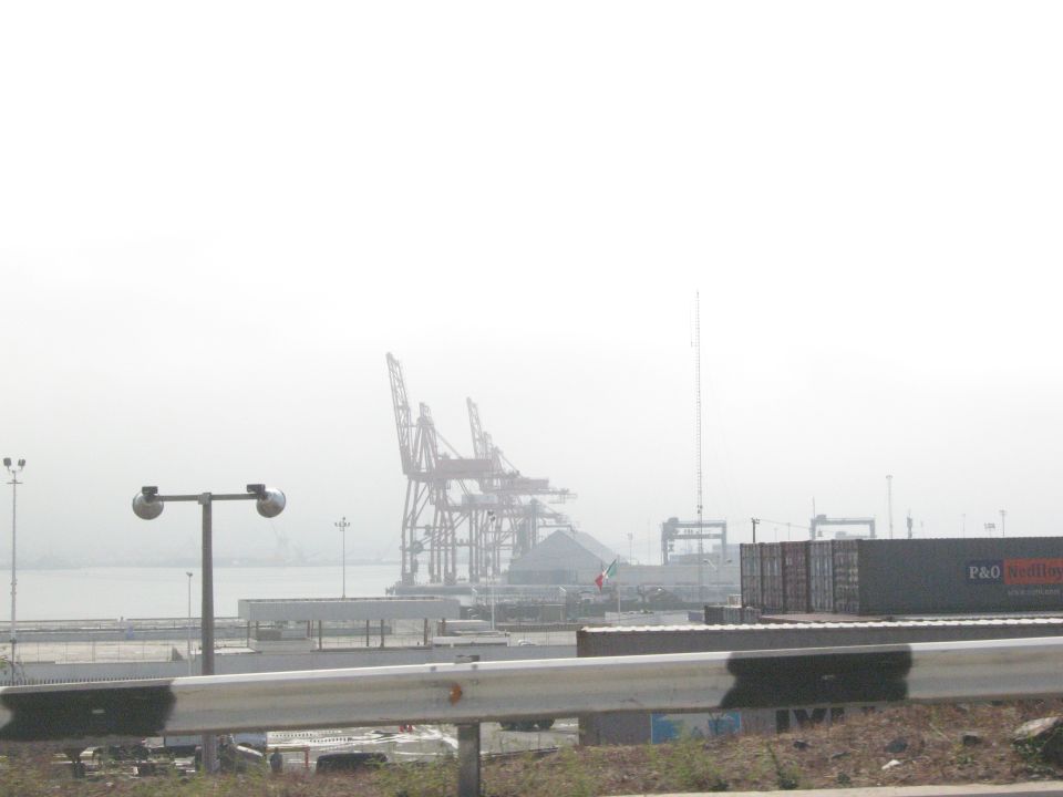 shipping cranes and containers at a port