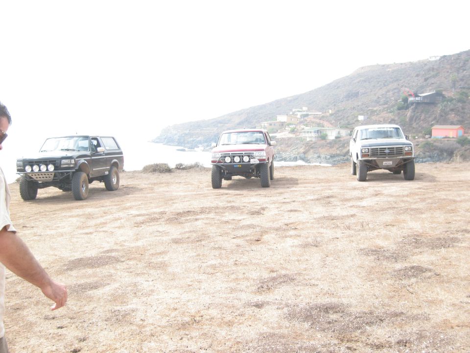 Black Ford Bronco with four auxiliary lights on the bumper