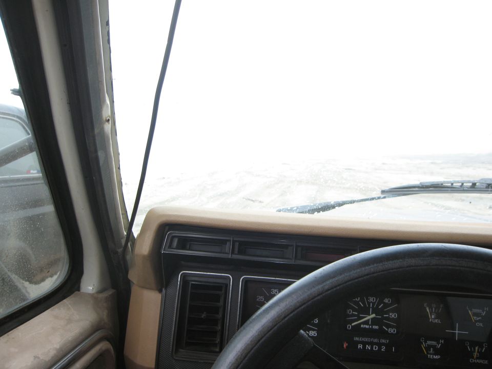 1986 Ford Bronco interior dashboard with gauges and steering wheel