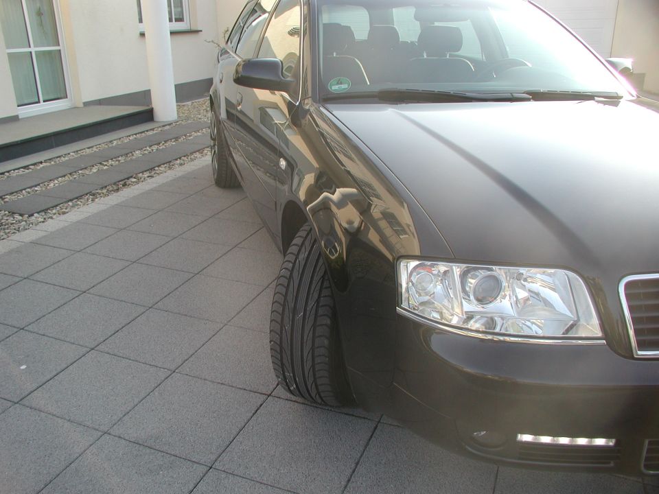 Dark 2003 Audi A6 front quarter view