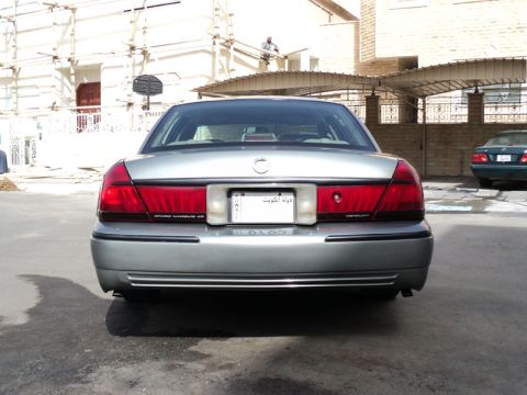 2001 Mercury Grand Marquis - Rear view of a silver 2001 Mercury Grand Marquis with a Kuwaiti license plate.