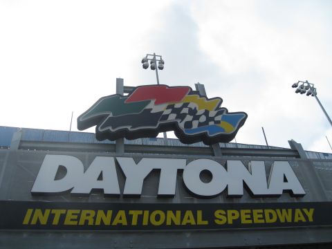 1994 Ford Probe - The iconic Daytona International Speedway sign is displayed prominently with its racing-themed logo.