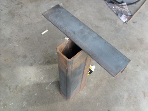 1986 Ford Bronco - Metal fabrication parts are shown on a concrete surface.