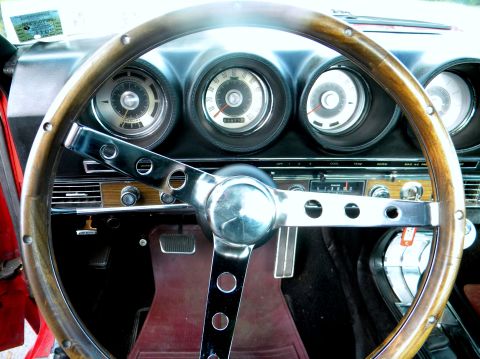 1979 Ford F-250 - The dashboard and steering wheel of a classic car, likely from the early 1970s, are shown in this interior view.