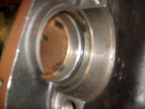 1986 Ford Bronco - This is a close-up view of a rusted metal component, likely a part from machinery.