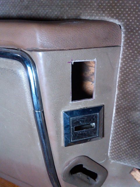 1986 Ford Bronco - Close-up of the interior panel showing a rear window switch and an empty slot, consistent with a 1986 Ford Bronco.