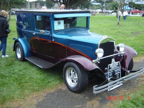 1993 Ford Bronco - This 1929 Plymouth sedan delivery features a two-tone paint job with flame accents and chrome wheels.